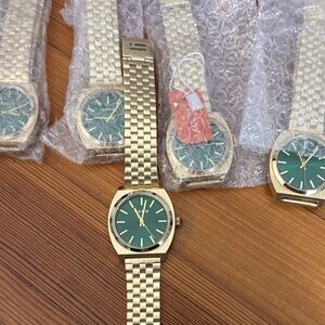 Wedding party gift. Gold and Green Watch